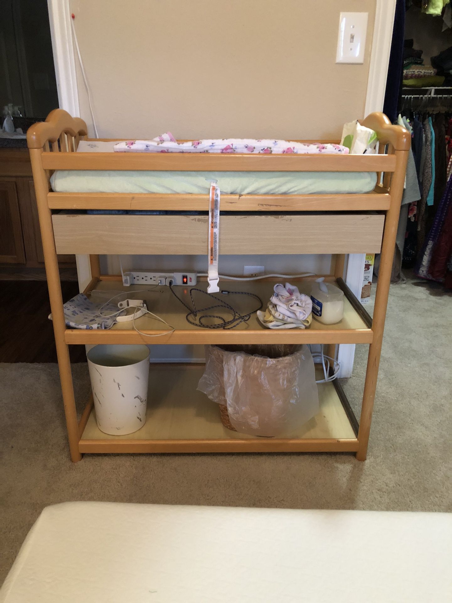Solid wood Diaper table paid 180$ asking only 35$ first come first serve. Has safety belt and drawer! Plenty of storage