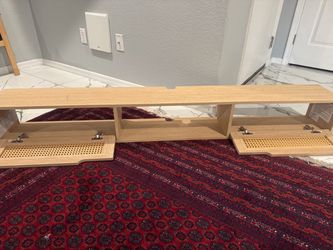 TV stand or wall mount that is stuck to the wall