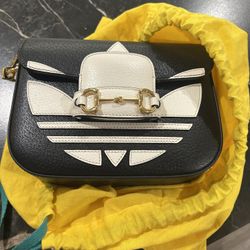 Gucci bag and adidas