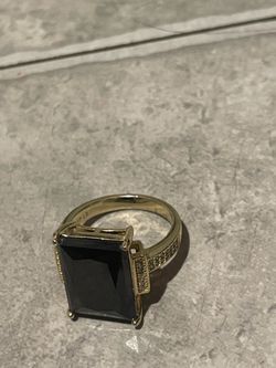 Gold ring with a Black diamond