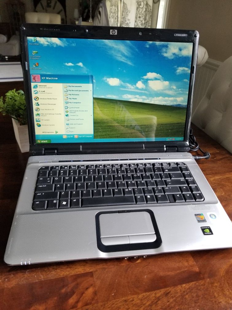 HP PAVILION ENTERTAINMENT PC LAPTOP | WINDOWS XP | 120GB HD | 2GB RAM | 3 USB PORTS | DVDRW | EXTENDED BATTERY | AMD @ 2.01 GHZ