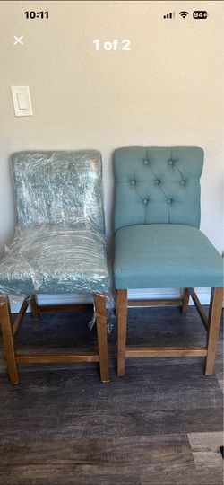 Two counter height chairs