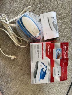 Brand new travel iron