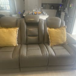 Gray Leather Sofas , 1 That fits 3 People & the Smaller For 2 People. 