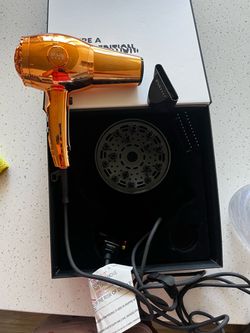Hair dryer with extra brushes