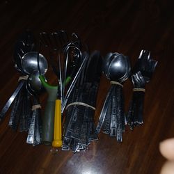 Lots of forks spoon knifes