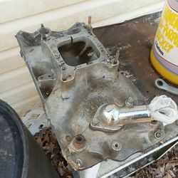 A Holley Carburetor Intake For Chevy Small Block Engines