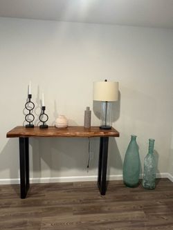 Entry table, lamp, candle holders, vases