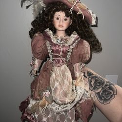 Porcelain collector doll