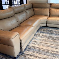 Macy’s Leather power-reclining sectional couch