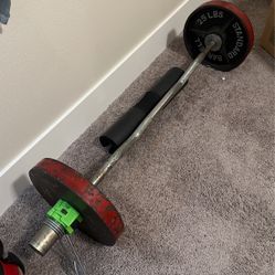 25 pounds in Olympic weight plus bar plus lifting pad plus weight stabilizers