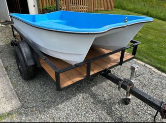 10ft Livingston Boat w/utility trailer & motor.