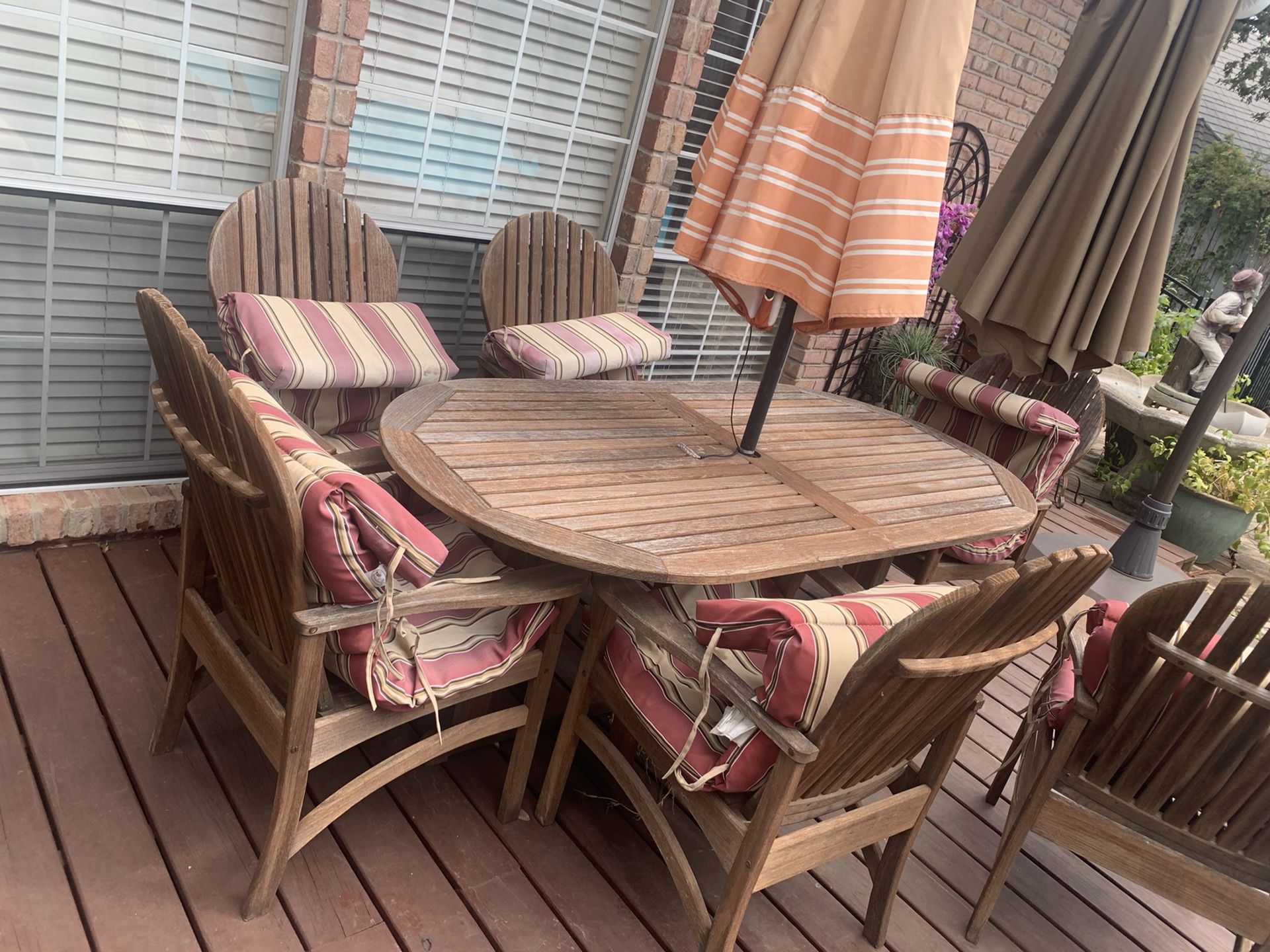 Outdoor se wooden table and 6 chairs with umbrella 450$