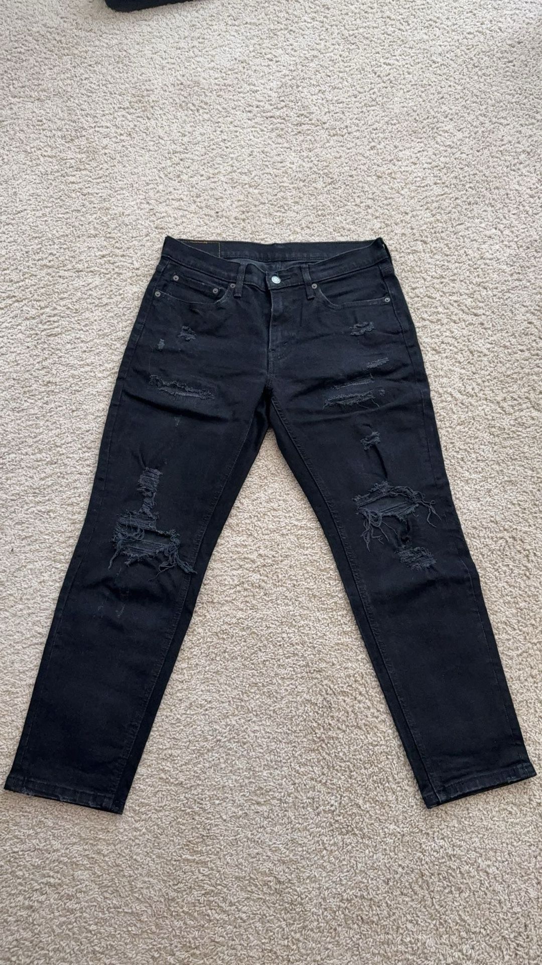Black Ripped Levi’s jeans