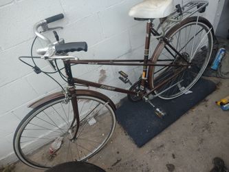 brown Raleigh Sprite bicycle