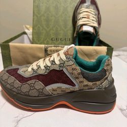 Gucci Men's GG Rhyton Canvas Fashion Sneakers  
