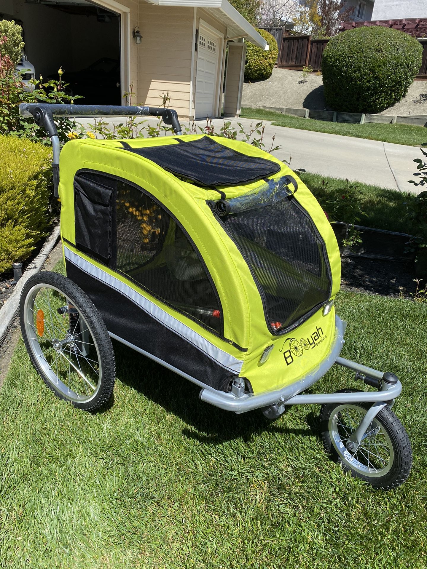 Please don’t ask about availability. It is available. Booyah Large pet dog stroller and bicycle trailer.