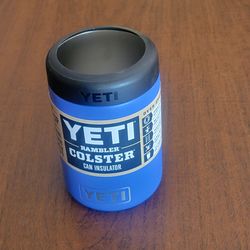 YETI Rambler Colster 2.0 can insulator in Offshore Blue New, never been 
used, with tags, upc 2.
it features a removable black top ring call