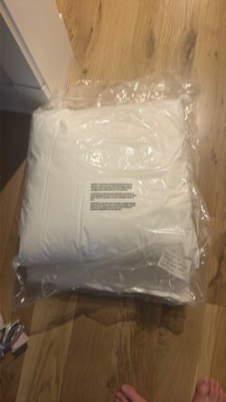 Two 20x20 never used pillows