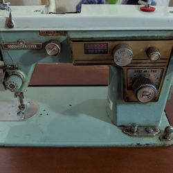 2 Antique Sewing Machines