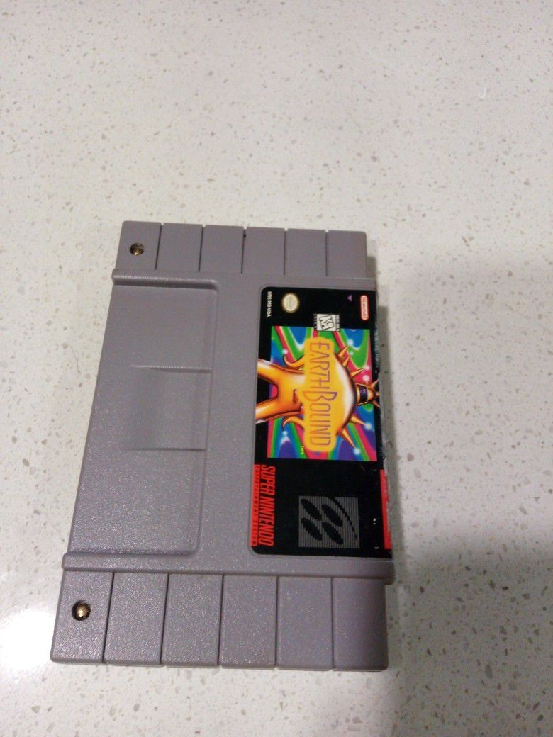 Earthbound authentic snes game. Would trade for nintendo related things of equal value.