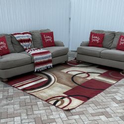 Nice sofa and loveseat set in great condition. By Ashley Furniture. Delivery available for an additional cost. Gray color. Price 200$