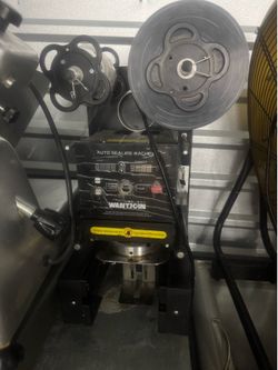Auto sealing machine
