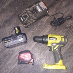 Like New Ryobi Drill With High Performance 18V 4Ah Extended Battery With Charger And Tape Measure