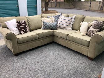 Macy’s Seafoam sectional w bed inside