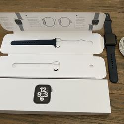 Series 7 Apple Watch (with two compatible chargers)