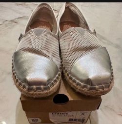 Tom’s silver metallic espadrilles