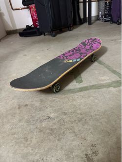 Pink/Yellow Skateboard