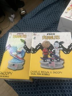 Charlie Brown Bobblehead an Snoopy