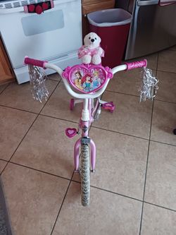 16" girls Disney princess bike, rides 3'2" / 4'2" Tall.  Excellent Condition like new.