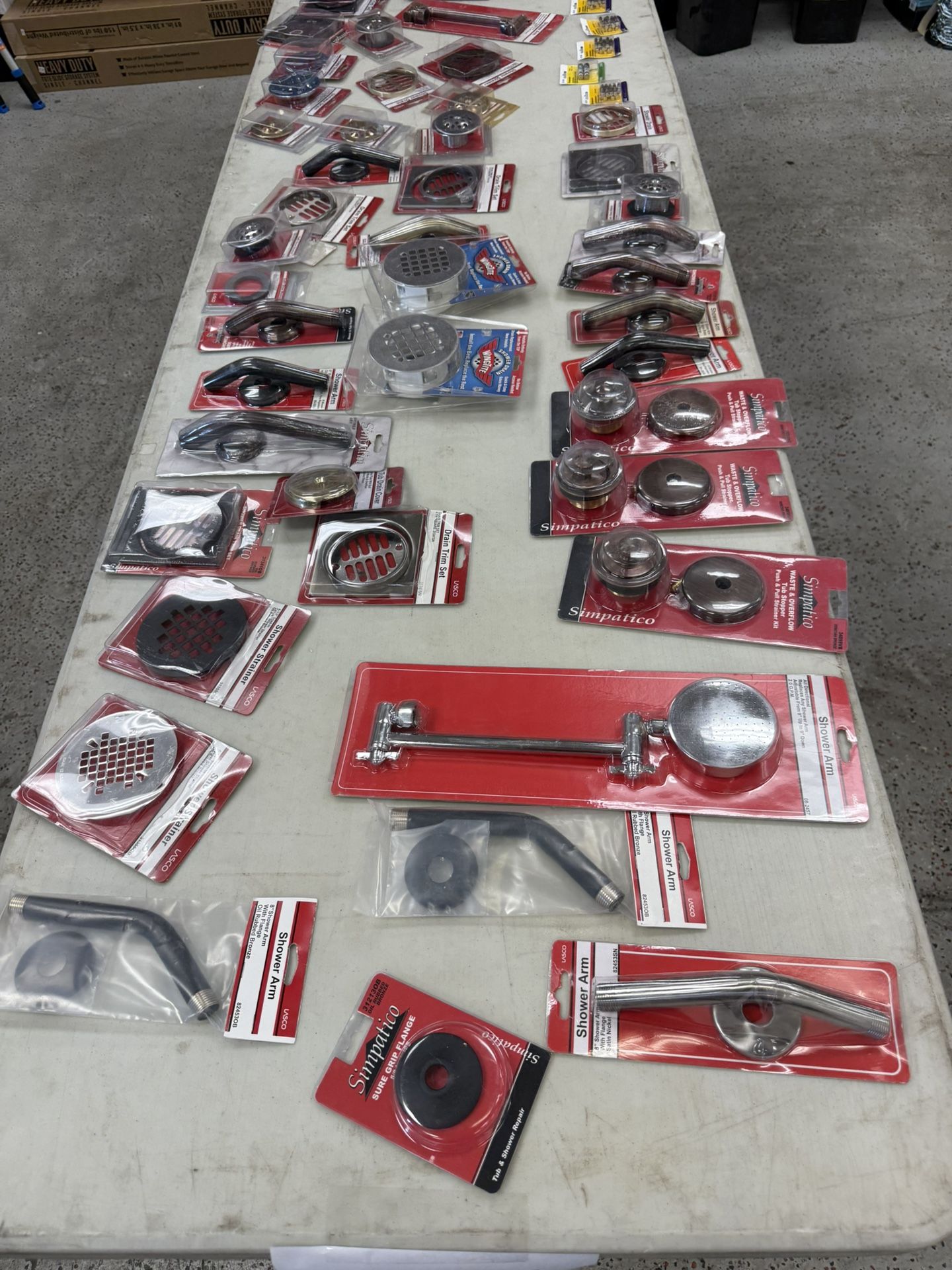 Tons of miscellaneous, plumbing, hardware, nails, window, stuff, and garage door hardware