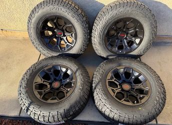 17x9 TOYOTA TRD WHEELS MATTE BLK 6x139.7 0MM RIMS + 265/70R17 FALKEN WILDPEAK TIRES TACOMA 4RUNNER