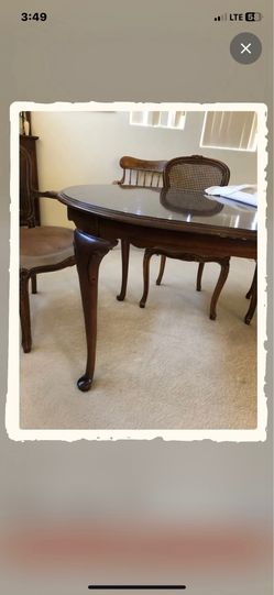 Antique French style dining room table and 6 chairs