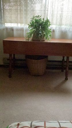 Solid  maple wood drop leaf table.