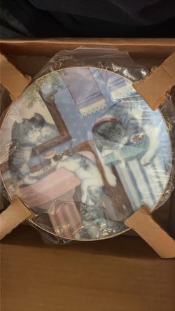 The plate is the vintage "Mischief Makers" collector plate from the Country Kitties series by artist Gre' Gerardi