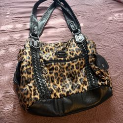 The Material Is Leathe And Its Brown 