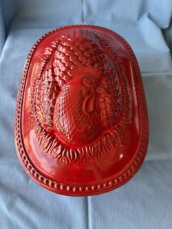 Red ceramic and terra cotta casserole dish with chicken design