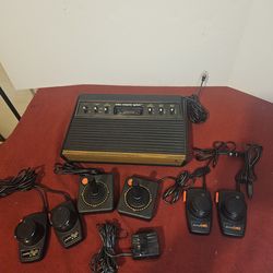 Atari 2600 CX2600 Home Console with Joystick and Paddle Controllers, RF, 1978