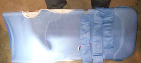 Small blue  pediatric rifton wave bath chair