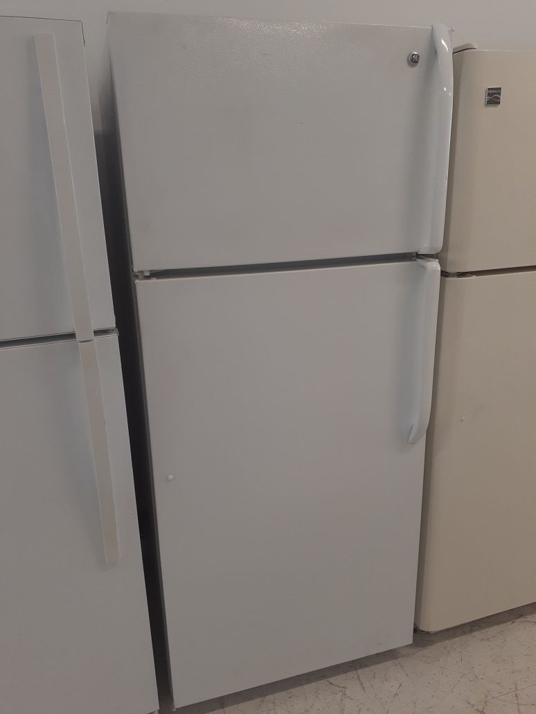 Ge top freezer refrigerator used good condition with 90 day's warranty
