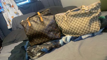 Vintage Gucci and Louis Vuitton bags