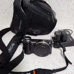 Sony A5000 Camera. Shutter Count 434. Body Only (No Lens). Includes 3 Batteries, Charger, Cable, Straps And A Bag
