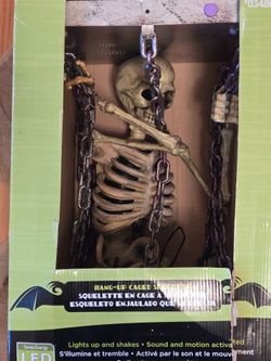 Halloween skeleton in cage