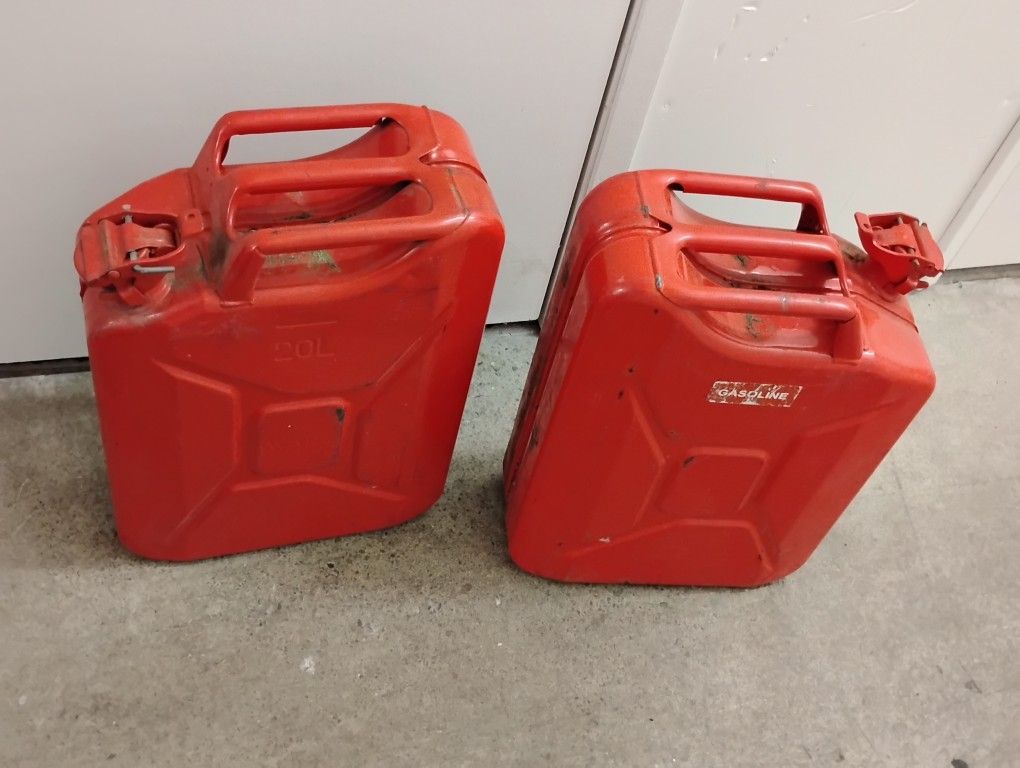 Metal Gas Cans 5 Gal.     $100 For Both!!! 