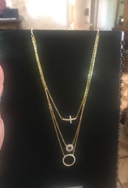 Cadenita de tres de plata chapiada el oro