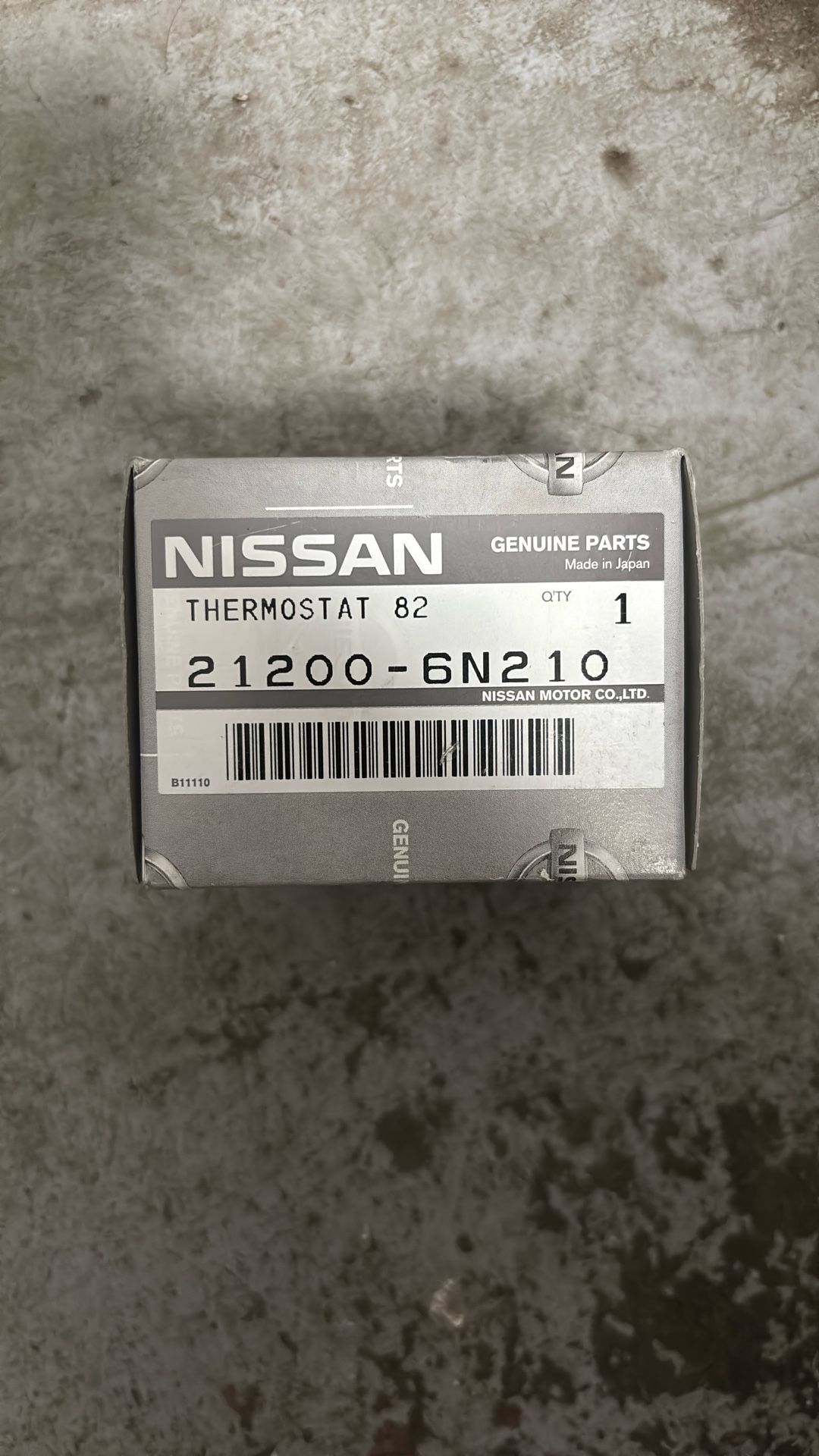 New In Box OEM Nissan Thermostat